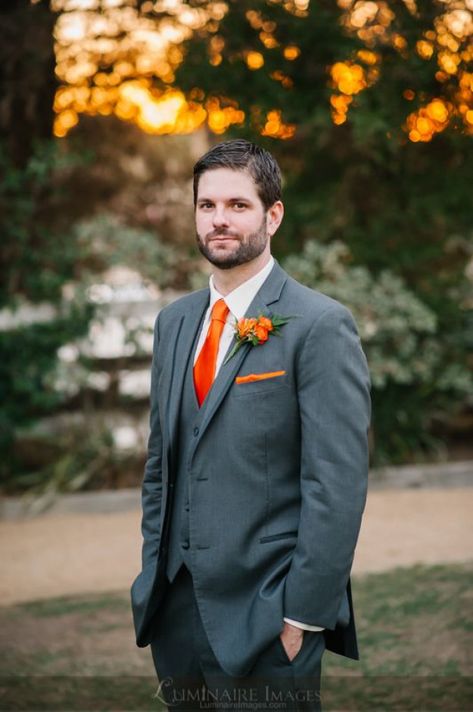 Dark gray suit bright orange tie kerchief and boutonniere #fatherofthebrideoutfit #father #of #the #bride #outfit #beach #wedding Outfit Ideas For Wedding, Father Of The Bride Outfit, Prom Blazers, Dark Gray Suit, Boda Mexicana, Groom Tuxedo, Grey Suit, Orange Tie, Men Suit