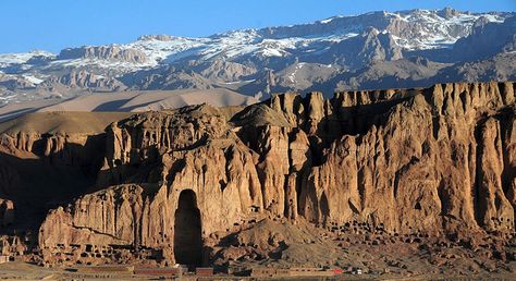 Sunrise shows the loss of the larger Bamiyan Buddha statue in the Bamiyan Valley, Afghanistan. Bamiyan Buddhas, Lost Civilizations, Steve Mccurry, World Photo, Silk Road, Ancient Ruins, Unesco World Heritage Site, Unesco World Heritage, Amazing Destinations