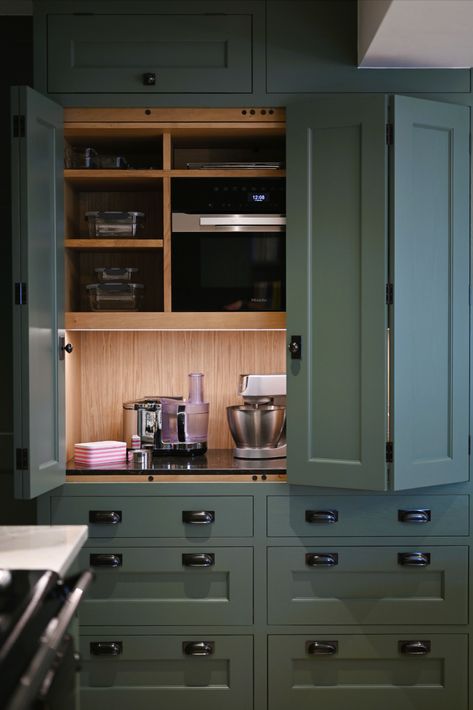 We love a clever kitchen storage solution to hide away your mess... like this moody green coffee station with a stunning oak interior by Luxmoore & Co.  Featuring Farrow & Ball 'Green Smoke' and Armac Martin luxury solid brass handles.  #luxmooreandco #storagesolution #bespokefurniture #greenkitchen Hidden Kitchen Storage, Kitchen Projects Design, Moody Green, Moms Kitchen, Armac Martin, Clever Kitchen Storage, Oak Interior, Storage Inspiration, Hidden Kitchen