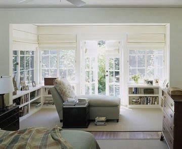 Sunroom Library, Bedroom Sunroom, Master Suite Remodel, Sunroom Office, Master Suite Addition, Low Bookshelves, Green Wall Color, Bedroom Addition, Bedroom Sitting