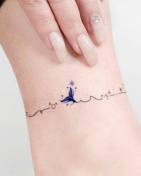 65 Awe-inspiring Wave Tattoos With Meaning - Our Mindful Life Ankle Bracelets Tattoos For Women, Tatuaje Studio Ghibli, Tato Paha, Ankle Bracelet Tattoo, Tattoos Infinity, Petit Tattoo, Anklet Tattoos, Tasteful Tattoos, Inspiration Tattoos