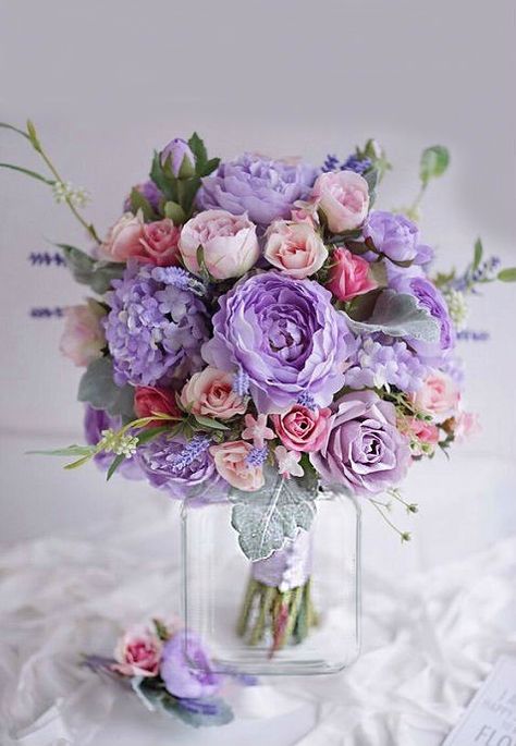 Roses, peonies, hydrangeas lilacs floral arrangement Prom Bouquet Ideas, Wedding Iceland, Peach Wedding Bouquet, Tangled Wedding, Pastel Wedding Theme, Quinceanera Bouquet, Prom Bouquet, Peach Bouquet, Purple Bouquets