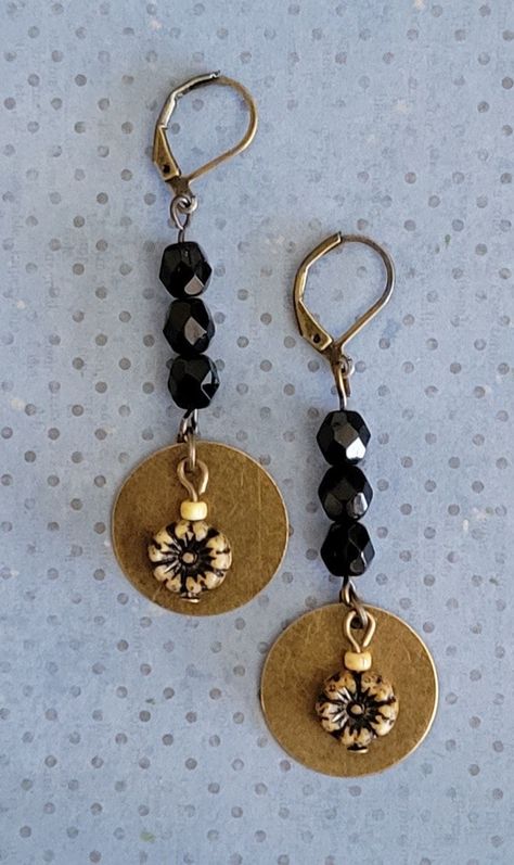 "Fabulous, black and tan Czech Flower, firepolished, Picasso seed bead, bronze plated brass lever back earrings. So adorable Each earring has an 8mm black and tan Czech flower bead, jet black fire polished Czech beads, Picasso seed beads, bronze tone findings, suspended from bronze plated brass lever back ear wires.   Earrings measure 2 3/8\" long from end to end. A great addition to anyone's collection.  Very Boho #BCF100" Bronze Czech Glass Jewelry With Ear Wire, Bronze Czech Glass Dangle Jewelry, Flower Fire, Czech Glass Black Beaded Jewelry, Elegant Black Czech Glass Earrings, Earrings 2024, Nickel-free Brown Czech Glass Beaded Earrings, Beaded Jewelry Bracelets, Black Fire