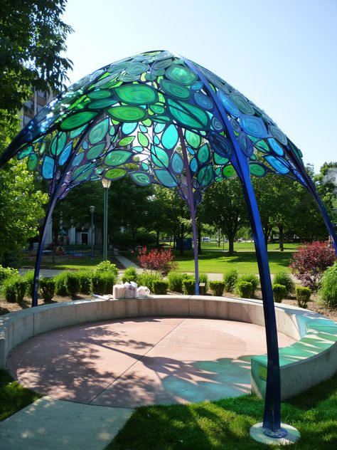 Seating area under a beautiful stained-glass art installation Glass Gazebo, Glass Art Installation, Urban Garden Design, Have Inspiration, Art Stained, Stained Glass Projects, Bath Soak, Art Installation, Gorgeous Glass