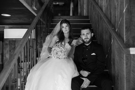 Have your couple sit on the stairs for a serious wedding photography vibe.