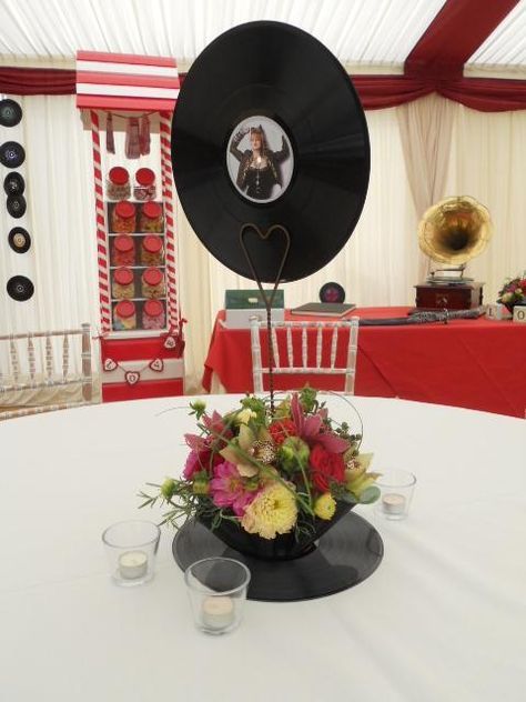 Miss Vintage Wedding Affair - A Vintage Wedding Fair: Vintage wedding fair Vinyl Record Centerpiece Ideas, Record Centerpiece, Music Centerpieces, 50s Theme Parties, 70s Party Theme, Rockabilly Wedding, Music Themed Parties, Music Themed Wedding, Vintage Centerpieces