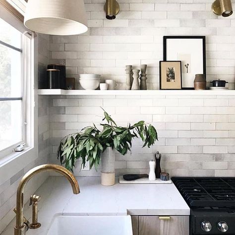 Some serene kitchen inspiration before the herd arrives. Time to get crankin for my 20+ crowd. To all those cooks out there, may your champagne never run out! 🥂 Kitchen Sink Ideas, Sage Kitchen, Stairs Decor, White Grout, Sink Ideas, White Subway Tile Backsplash, Brass Kitchen Faucet, White Counters, Fireclay Tile