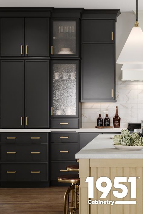 Limitless options in the palm of your hand, and more than a finishing touch. Handles, pulls, and knobs are the smallest details that pack a punch. Complement a look, or add a spark of surprise. 
📍 Save this Pin
🔗 Explore hardware offering
📸 Featured Cabinetry: Belcourt Painted Black

#1951Cabinetry #HardwareDesign #CabinetHardware #InteriorDetails #DesignInspiration #HandlesAndPulls #DecorativeKnobs #FinishingTouches #HomeStyle #ModernHardware #SmallDetailsBigImpact #HomeInspo #CabinetryDesign #UpgradeYourSpace #DesignTips #HomeDecorIdeas #ExploreHardware #HomeJewelry #CabinetMakeover #HardwareLove Transitional Kitchen Black Cabinets, Hardware Organizer, Black Cabinet Hardware, Cabinet Detailing, Painted Cabinets, Hardware Resources, Black Cabinet, Modern Hardware, Cabinet Makeover