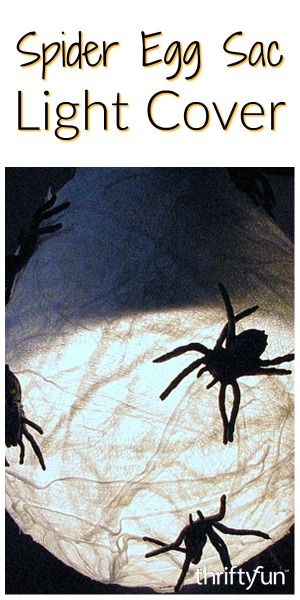 This is a guide about making a spider egg sac light cover. Add some Halloween fun to your porch light with this spider egg sac decoration. Halloween Porch Light Cover, Halloween Porch Lights, Halloween Lights Diy, Diy Halloween Porch, Halloween Eggs, Porch Light Covers, Spider Eggs, Ceiling Light Covers, Front Porch Lighting