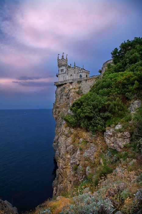 Swallow's Nest Castle in Ukraine Cliff Castle, European Castle, Purple Clouds, Cinderella's Castle, Old Castle, High Castle, Famous Castles, Deck Railing, Beautiful Castles