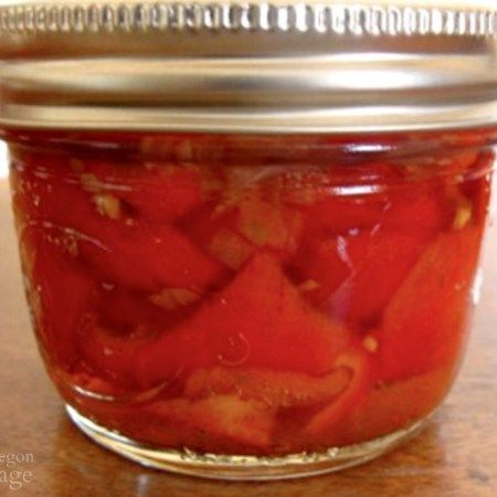 Make your own home canned roasted red peppers in a wine-flavored brine using boiling water bath to safely keep roasted peppers on your pantry shelf. Canning Roasted Red Peppers, Fire Roasted Red Peppers, Oregon Cottage, Wine Recipe, Canning Food Preservation, Recipe Tutorial, Pint Jars, Pantry Shelf, Roasted Peppers