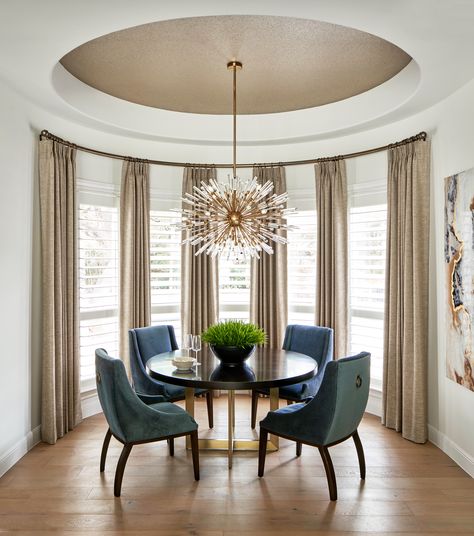 This lovely breakfast area with sputnik chandelier is part of a whole house remodel by Haven Design and Construction.  The round ceiling is wallpapered in a metallic cork that picks up the colors in the drapery and modern artwork on the adjoining wall.  A custom curved drapery rod and floor length linen drapery finishes off the look. Big Dining Table, Large Round Dining Table, Cork Wallpaper, Open Floor Plan Kitchen, Transitional Dining Room, Transitional Dining, Wallpaper Ceiling, Round Dining Room, Dining Room Combo