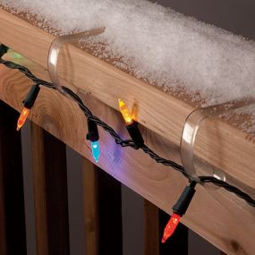 Try using plastic picnic tablecloth clips to attach Christmas lights to your deck railing. Christmas Lights Outside, Christmas Light Installation, Hanging Christmas Lights, Christmas House Lights, Picnic Tablecloth, Deck Railing, Xmas Lights, Deck Lighting, Outdoor Christmas Lights