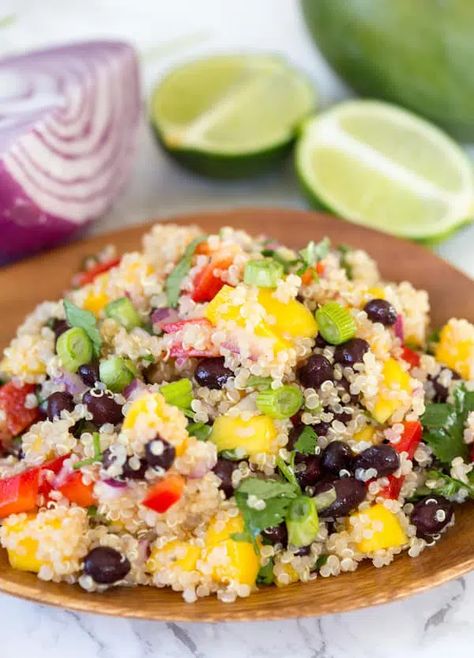 Mango Black Bean Quinoa Salad | greens & chocolate Easy Recipes Vegan, Vegan Mexican Quinoa, Black Bean Quinoa Salad, Bean Quinoa Salad, Mexican Quinoa Salad, Vegetarian Side Dish, Quinoa Dishes, Potluck Side Dishes, Mexican Quinoa