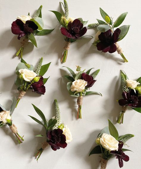 Floral Buttonholes featuring Chocolate Cosmos, spray roses and Eucalyptus.