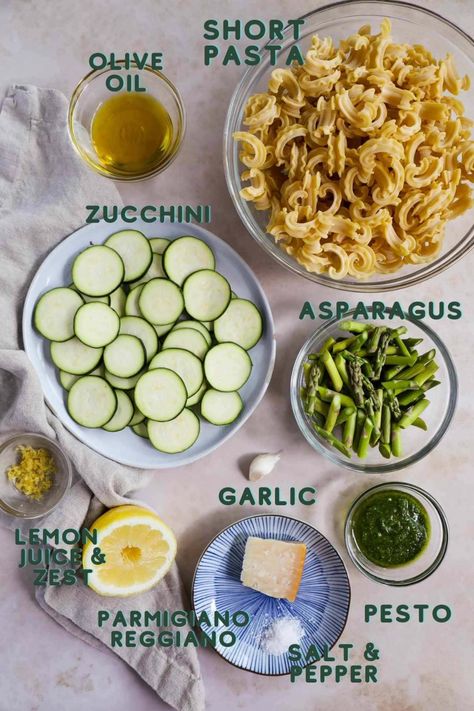 Veggie Pesto Pasta is a flavorful, nutritious weeknight dinner that comes together in just 25 minutes. This bright and zesty vegetarian dish features al dente pasta, zucchini, and asparagus tossed in herby pesto, lemon juice, and zest. This is a great entry-level recipe to make for a weeknight dinner and entertaining. It's affordable, comes together quickly in one pan, and feeds a crowd easily! Pesto Pasta Bake Vegetarian, Pesto Pasta Veggies, Zucchini Asparagus Pasta, Zucchini Asparagus Recipes, Pesto Pasta With Vegetables, Pesto Pasta With Zucchini, Veggie Pesto Pasta, Zucchini And Asparagus, Veggie Pesto