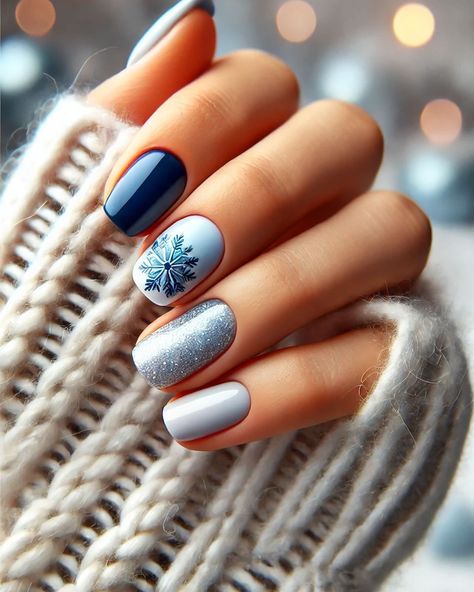 Step into winter with this beautiful snowflake nail design! ❄️ Featuring a clear, intricate snowflake on deep blue, paired with icy silver and frosty gray shades for a truly magical look. Perfect for festive gatherings and cozy winter nights! 💙✨ #WinterNails #SnowflakeNails #WinterWonderland #HolidayNails #NailArt #CozyVibes #FrostyNails #NailInspo #WinterAesthetic Powder Blue And Silver Nails, Blue And Snowflake Nails, Snowflake Nail Design Blue, Navy Snowflake Nails, Winter Nails Multicolor, Simple Blue Christmas Nails, Blue Gray Nails Design, Frosty Blue Nails, Snow Nails Winter Blue