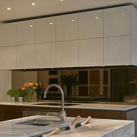 Gorgeous MIRROR SPLASHBACK 💙♥💙 ▪ Do you want timeless #kitchen look?? Mirror #splashback are perfect for modern kitchen that offers timeless look, I mean your #mirror splashback will look stunning years after years as they were new. 👉We offer mirror splasback in various colours like Black, Bronze, Grey etc. ▪ ▪ #mirrorcitysydney #mirrors #sydney #designideas #kitchendecor #decor #modernmirror #sydneyaustralia #australia #design #interiordecor #mirrorsplashback #glasssplashback #glass Dark Mirror Backsplash, Bronze Mirror Splashback Kitchen, Smoky Mirror Splashback Kitchen, Smoked Mirror Splashback Kitchen, Mirror Splashback Kitchen, Bronze Mirror Splashback, Modern Kitchen Handles, Glass Splashbacks Kitchen, Trendy Kitchen Tile