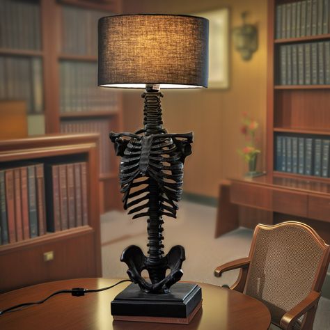 Which gothic table lamp is your favorite? 🌙💀 1. Full Skeleton Lamp - Make a bold statement with this unique piece that combines eerie elegance and striking design. 2. Tall Vertebrae Spine Lamp - Elevate your space with this towering, intricately detailed lamp perfect for adding a dramatic touch. 3. Compact Vertebrae Spine Lamp - Perfect for desks or small tables, this lamp offers a blend of gothic charm and functionality. All three lamps are now available at GothicPlus.com! Enhance your hom... Skeleton Table, Skeleton Lamp, Gothic Lamp, Halloween Lamp, Lamp With Black Shade, Gothic Table, Creepy Home Decor, Trick Or Treat Studios, Salt Lamps