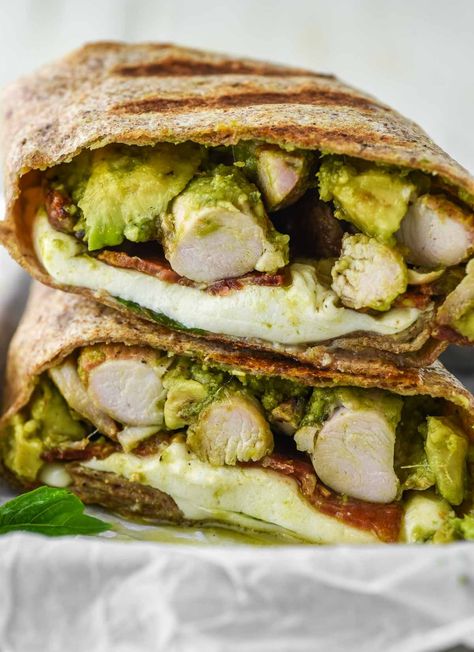 Filled with chicken, homemade pesto, avocado, bacon and cheese, this chicken pesto wrap is simple, filling, and delicious. #chickenpestowrap #chickenwrap #wrap | chiselandfork.com Pesto Chicken Wrap, Chicken Pesto Panini, Pesto Wrap, Pesto Meatballs, Avocado Wrap, Pistachio Pesto, Chicken Pesto, Avocado Pesto, Grilled Chicken Thighs