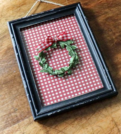 Quick and Easy Christmas Artwork Using Wrapping Paper | Noting Grace Christmas Framed Art Diy, Framed Wrapping Paper Wall Art, Wrapping Wall Art For Christmas, Diy Christmas Artwork, Framed Wrapping Paper, Leftover Wrapping Paper, Christmas Yarn Crafts, Christmas Wall Decor Diy, Diy Framed Art