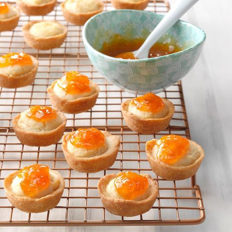 These delicate, buttery tarts melt in your mouth. With their jeweled apricot tops, they make a pretty presentation on your holiday cookie tray.—Julie Dunsworth, Oviedo, Florida Traditional Easter Dinner, Mini Thanksgiving Desserts, Mini Pie Recipes, Tartlets Recipe, Apricot Recipes, Traditional Easter, Afternoon Tea Recipes, Holiday Pies, Easter Dinner Recipes