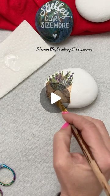 Shelley Clark Sizemore on Instagram: "Decoupage napkins onto rocks ! Have you tried this ? It’s fun ! Liquitex Matte Medium is available at JoAnn, Michael’s, Amazon ! Make sure you peel your napkin layers down to one ply so you don’t have any lumps ! I’m using tweezers to peel away extra layers. Because matte medium is MATTE - now I can watercolor or Derwent Inktense on top of this design ! Have fun ! Authentic Santorini stones are available at StonesByShelley.Etsy.com ! Beautiful napkins for decoupage are available at CraftsByDanaYint.Etsy.com ! Decoupage FAQ : 👀Can I hide this outside ⭐️I wouldn’t recommend this, it’s best for indoor gifts 👀Do i need to seal after ⭐️YES ! Always 👀Is Liquitex Matte Medium a sealant ⭐️No - this is simply to adhere the design, the i Derwent Inktense, Napkins For Decoupage, Matte Medium, Decoupage Napkins, Have You Tried, Tweezers, You Tried, Santorini, Make Sure