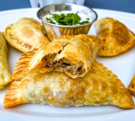 This Easy Beef Empanadas Recipe is the perfect appetizer loaded with ground beef, melted cheese, and seasoned to perfection with homemade taco seasoning. The dish comes together quickly using Goya empanadas wrappers. This South American and Puerto Rican dish is perfect for any gathering, including Cinco de Mayo. Goya Empanadas Recipe, Cheese Empanadas Recipe, Beef Empanadas Recipe, Cheese Empanadas, Empanada Recipe, Beef Empanadas, Colombian Food, Fry Recipes, Empanadas Recipe