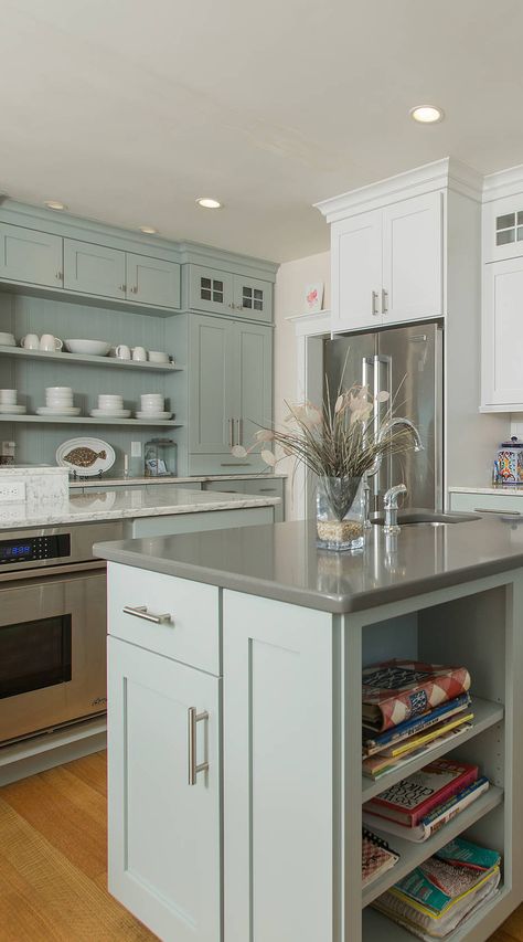 Beach Style Kitchen With Sage Green Cabinets Another sage green and white cabinetry with gray countertop. However, we see another island with marble countertop on! We loved creating space according to your needs using two islands! Green Kitchen Grey Countertop, Kitchens With Gray Countertops, Green Cabinet Grey Counter, Sage Green Countertops Kitchen, Kitchen 2 Colors, Sage Green And Gray Kitchen, Green Cabinets Grey Countertops, Green Kitchen Cabinets Grey Walls, Sage Green Countertops