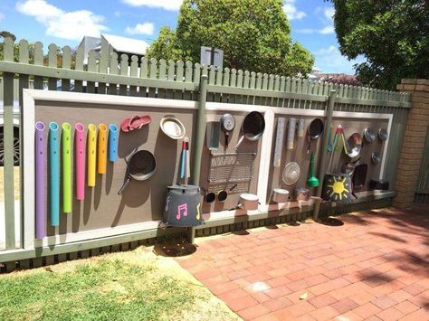 Playground Wall Ideas, Outside Music Wall, Outdoor Play Wall, Music Wall Playground, Preschool Yard Outdoor Spaces, Kids Fence Ideas Play Areas, Outdoor Music Wall For Kids, Outdoor Music Area, Kids Outdoor Spaces