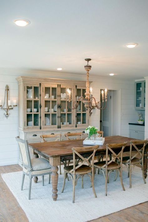 Different wood finishes in this dining room add texture without being too overwhelming, and this dining table can sit up to 8! HGTV Country House in a very Small Town, 20 Best Fixer Upper Rooms via A Blissful Nest Stile Joanna Gaines, Joanna Gaines Dining Room, Fixer Upper Dining Room, Mixed Dining Chairs, Dining Room Buffet Decor, French Country Dining Room Decor, French Country Dining Room, Farmhouse Dining Room Table, 2024 Kitchen