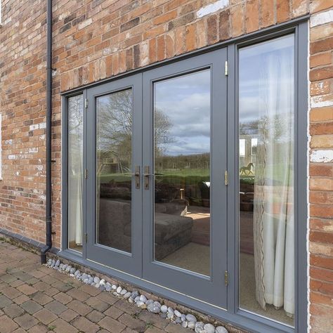 Dark grey wooden French doors Timber Patio, Dark House Exterior, Fromt Doors, French Doors To Deck, French Doors Living Room, French Doors Patio Exterior, Doors With Sidelights, New Door Design, Aluminium French Doors