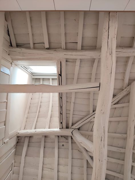 restoration unveils centuries-old roof structure inside portuguese residence Wooden Roof Ceiling, Wood Roof Interior, Wooden Roof Structure, Wooden Roof, Roof Ceiling, Wood Roof, Indoor Window, Zaha Hadid Architects, Roof Structure