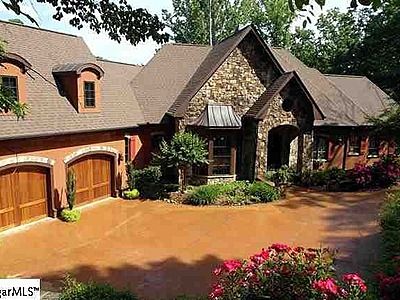 colored concrete driveway Montana Lodge, Lodge House Plans, Lodge House, Lodge Room, Rustic Exterior, Mountain House Plans, Walkout Basement, Craftsman Style House Plans, Craftsman House Plan