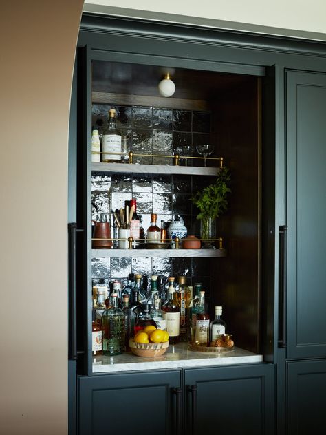 dark green bar hidden behind cabinet doors Dark Green Bar, Mountain House Kitchen, Dallas Bars, Closet Bar, Green Bar, Travel Advisor, Bay House, Home Libraries, Bar Cabinet