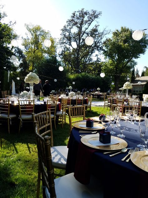 Outdoor Navy Blue and Gold wedding Midnight Blue And Gold Wedding Theme, Navy Blue And Gold Sweet 16 Theme, Navy Blue And Gold Reception Decor, Navy And Gold Grad Party, Navy Blue And Gold Corporate Event, Navy Blue Graduation Party, Gold Inspo, Blue Graduation Party, Navy Blue Party