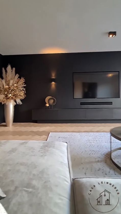 Black Wall Tv Unit, Minimalist Home Theater, Black Feature Wall Living Room With Tv, Dark Grey Tv Wall, Black Entertainment Wall, Black Marble Tv Wall, Dark Tv Wall, Black Media Wall, Living Room With Black Furniture