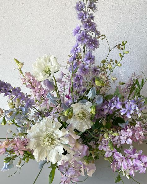 Textural and twirly ~ sweet peas & larkspur. Grateful list of the day: a physically demanding job that helps me go to bed tired, a healthy body to do said job, and clean water to shower said body from said job. Written by one currently very dirty flower farmer as she waits for the water to heat up 🥰 #flowerfarmer #farmerflorist #larkspur #sweetpeas #cagrownflowers #localflowers #fresnoflorist #flowersubscription #clovisflorist #sustainablefloristry #sloweddingflorist #sloflorist Larkspur Bouquet, Grateful List, Purple Sweet Pea, Purple Larkspur, Sweet Pea Bouquet, Flower Subscription, Flower Farmer, Sweet Peas, Go To Bed