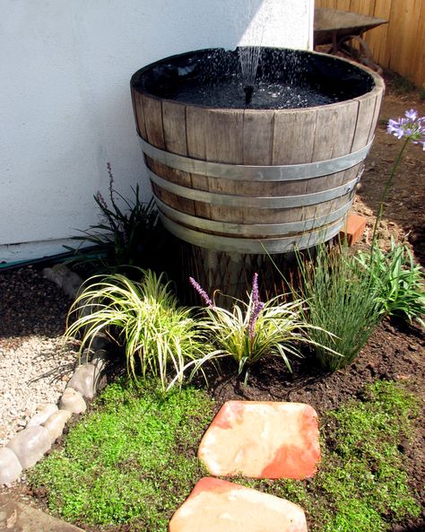 Barrel Pond Ideas, Barrel Fish Pond, Half Barrel Planter Ideas, Wine Barrel Water Feature, Barrel Garden Ideas, Whiskey Barrel Fountain, Barrel Pond, Fish Pond Ideas, Diy Whiskey Barrel