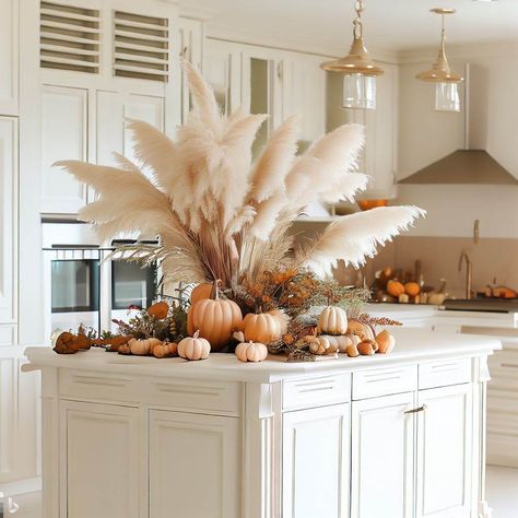 Step into a world of timeless elegance and embrace the enchanting allure of autumn in our Exquisite White Kitchen, adorned with an array of pumpkins, delicate maple leaves, and feathery pampas grass. The pristine white backdrop sets the stage for a sophisticated and glamorous seasonal display, exuding warmth and style. Craft an unforgettable, elegant autumn display that will captivate and delight all who enter. Fall Decor Pampas, Pampas Grass Halloween Decor, Pampas Grass And Pumpkins, Fall Pampas Grass Decor, Fall Stage Decor, Outdoor Entryway Decor, Plant Stand Table, Soft Launch, Cosy Autumn