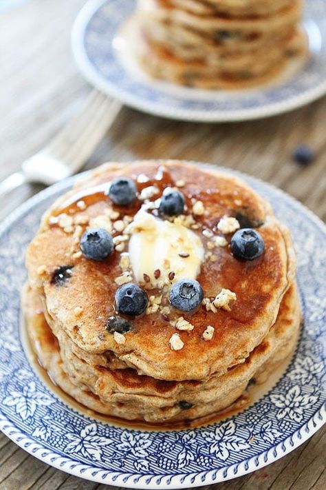 Whole Wheat Blueberry Granola Pancake Recipe from twopeasandtheirpod.com Our family loves these pancakes! Granola Pancakes, Blueberry Bites, Blueberry Granola, Heart Pancakes, Stack Of Pancakes, Whole Wheat Pancakes, Wheat Pancakes, Blueberry Oat, Oat Pancakes