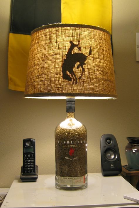 DIY Whiskey Bottle Lamp. I have one of these and would like to make another one, perhaps a larger one. Pendleton Whiskey, Diy Whiskey, Diy Bottle Lamp, Western Lamps, Gadget Tecnologici, Lamps Decor, Bottle Lamps, Lampe Diy, Diy Lampe