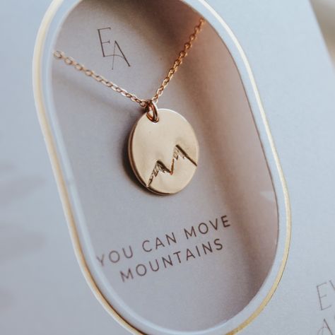 You can move mountains.Product DetailsNecklace comes in either gold-filled or sterling silverChain can be adjusted from 16 to 18 inchesCharm measures 1/2 inches in diameterHand stamped2 inch necklace extenders can be purchased separatelyEver Aster inspires meaningful connections by spreading hope and simplicity through its jewelry. These pieces are the perfect gift to convey a heartfelt message to your loved one that shines with thoughtfulness, kindness, and gratitude. We hope you find as much j Jewelry Made From Old Wedding Rings, Meaningful Necklaces, Meaningful Rings, Christian Accessories, Christian Shirts Designs, Wanderlust Jewelry, Meaningful Necklace, Mountain Jewelry, Metal Stamped Jewelry