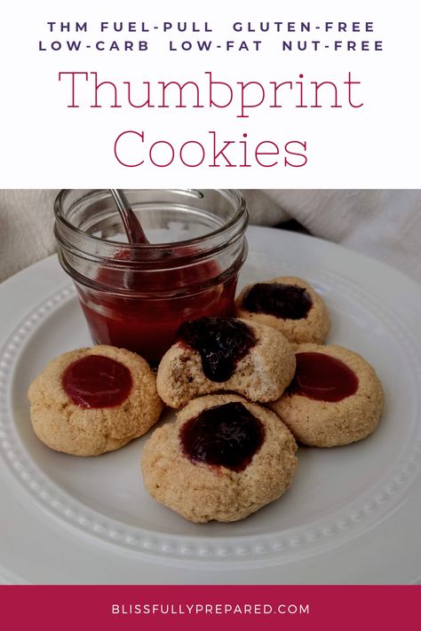 Thumbprint Cookies are elegant and festive, though easy to make! And now they are also #lowcarb AND #lowfat , too! Only 26 calories per cookie! #thm #trim #healthy #mama #trimhealthymama #keto #lowcalorie #highprotein #sugarfree #glutenfree #nutfree #sugarfreejam #fruitfilled #holidaycookies #christmascookies #thmfuelpull #fuel #pull #fuelpull #thmfp #fp #thmfuelcycle #thmfc #fuelcycle #cookies #thumbprint #buttercookies #sugarcookies #wheyprotein #oatfiber #psylliumhusk #macrofriendly #easy Thm Fuel Pull, Cookies Thumbprint, Chocolate Meringue Cookies, Thm Fp, Fuel Pull, Sugar Free Jam, Trim Healthy Momma, Chocolate Meringue, Keto Biscuits