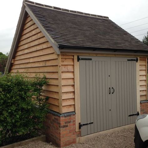 Cottage Garage Ideas, Wooden Garage Ideas, Oak Frame Garage, Garden Garage Ideas, Oak Framed Garage, Garage Cladding Ideas, Shed Cladding Ideas, Cladded Garage, Garage Shed Ideas