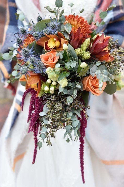 This fall wedding bouquet idea is perfect! Orange flowers and thistle are on trend for fall wedding season #arletbridal #wedding #weddingflowers #weddingbouquets #bridalbouquet #fallwedding #fallweddingideas #fallweddingflowers #orangewedding #weddingtrends #fallweddingdecorations #weddingflowersforallseasons August Wedding Flowers, Bouquet With Greenery, Bridal Bouquet Fall, August Wedding, Fall Wedding Bouquets, Fall Wedding Flowers, Fall Wedding Decorations, Maine Wedding, Arte Floral