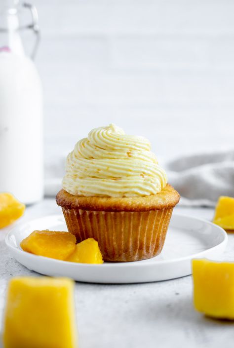 Mango Cupcakes - fitandfull.ca Dainty Cakes, Mango Cupcakes, Fluffy Cupcakes, Tropical Twist, Mango Flavor, Gluten Free Vegetarian, Gluten Free Recipes, Frosting, Cupcake Cakes