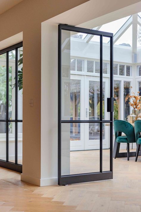 The charm of steel-framed glass pivot doors - FritsJurgens Steel Door Design, Pivot Door, Black Front Doors, Glass Doors Interior, Pivot Doors, Black Floor, Main Door, German Design, Steel Doors