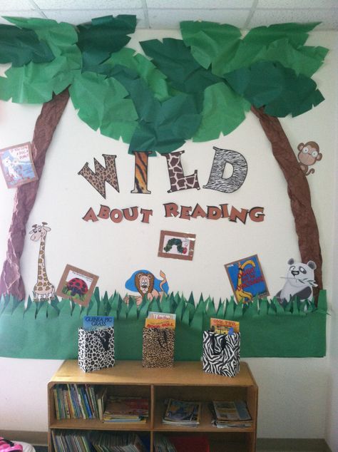 Preschool reading area. Safari Reading Corner, Jungle Theme Library Classroom Ideas, Jungle Infant Classroom, Jungle Reading Corner, School Book Corner, Storybook Classroom, Preschool Reading Area, Kindergarten Classroom Ideas, Reading Environment