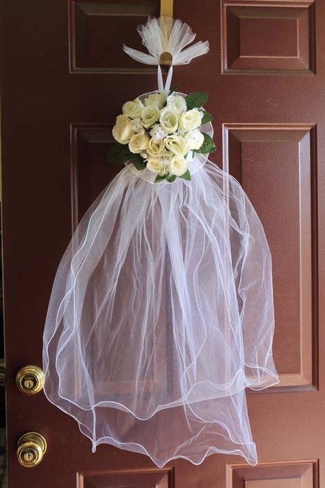 My daughter is getting married soon, so my other daughters and I are hosting a bridal shower for her and her friends. I saw a cute pin on Pinterest about hosting a bridal shower and it had a cute d… Wedding Door Decorations, Spring Umbrella, Bridal Shower Veil, Make Craft, Bridal Shower Decorations Diy, Wedding Isles, April Showers Bring May Flowers, Door Hangers Diy, Baby Afghan